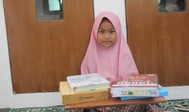 Okta Ingin Jadi Hafizhah 